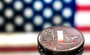 coin of litecoin on an American flag background, the concept of virtual money, closeup